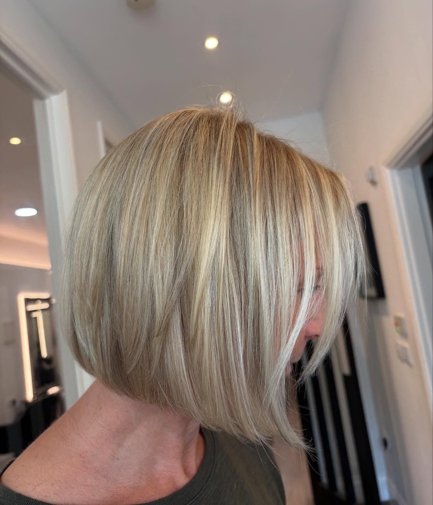 A precision graduated bob in blonde, photographed from the side