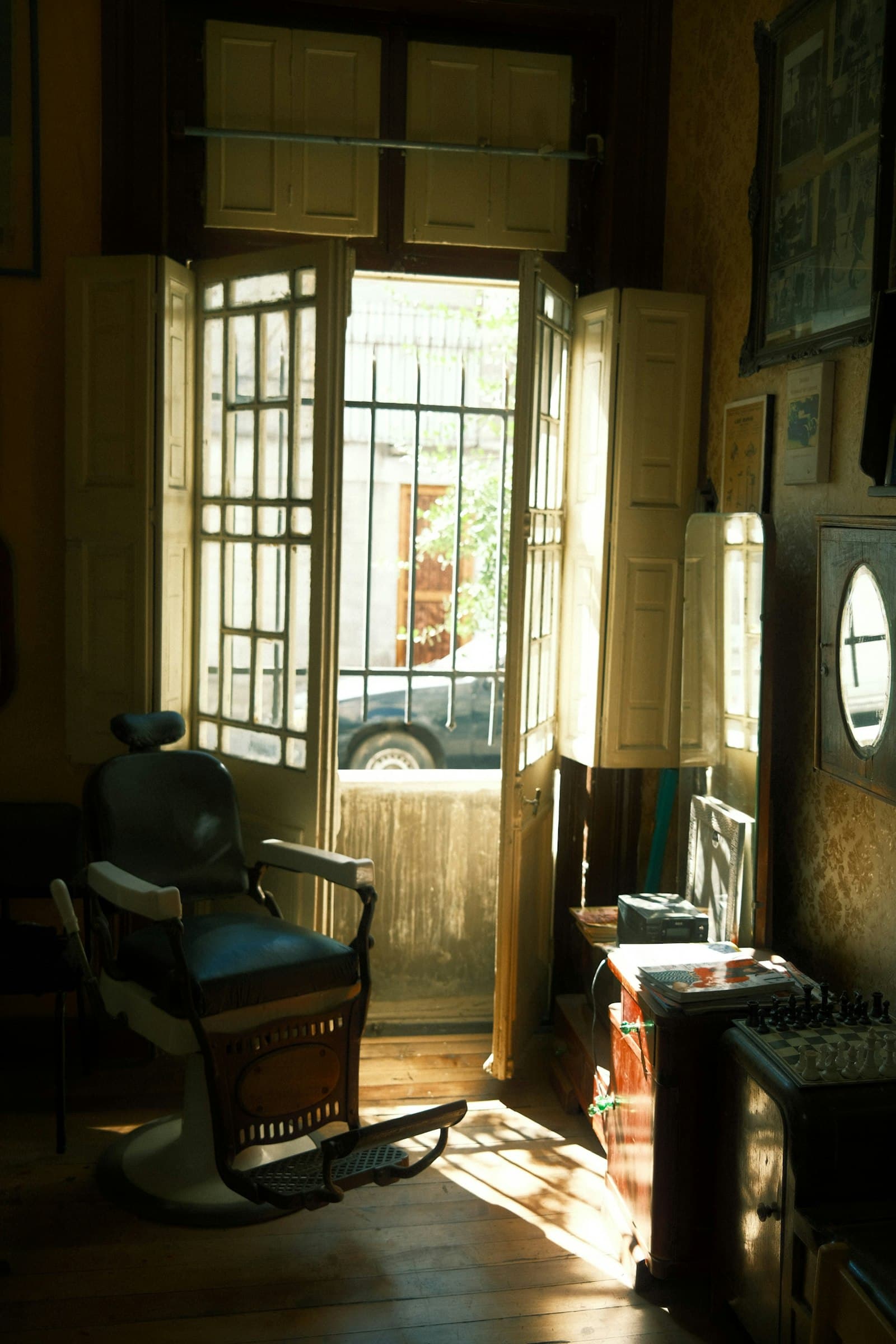 A classic barber chair in warm window light
