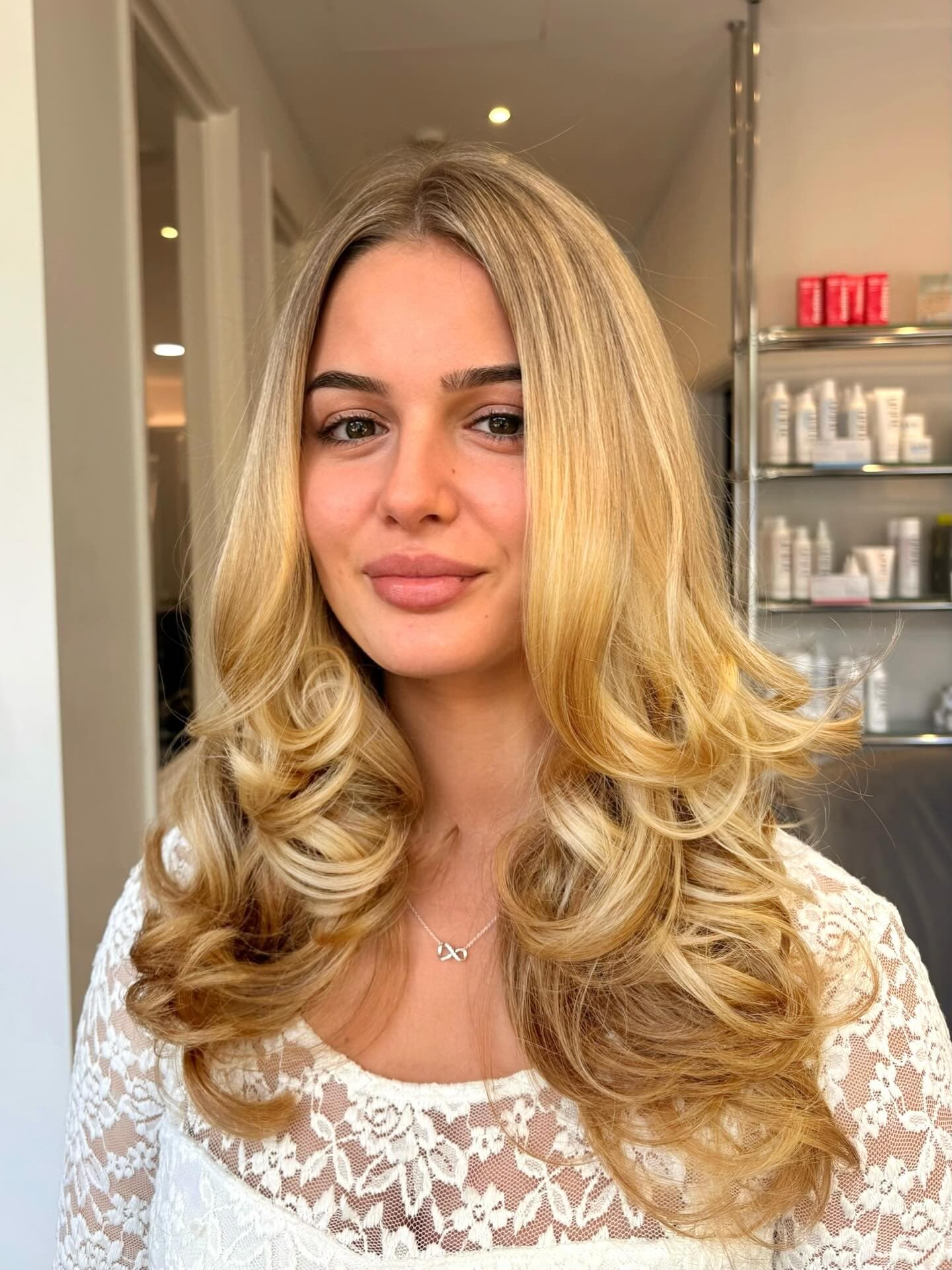 A golden blonde bouncy blow dry, from the Clay Instagram feed