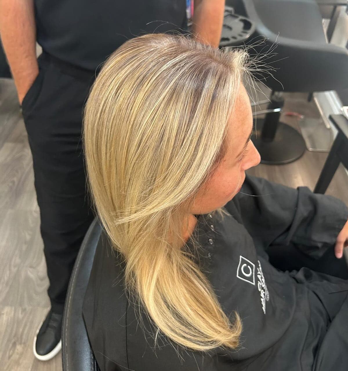 Soft blonde layers photographed from the side, from the Clay Instagram feed